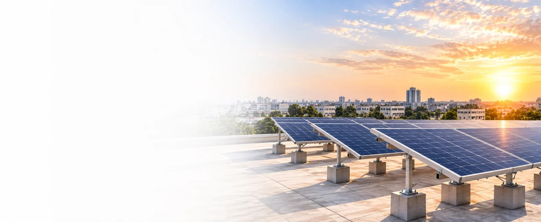 Solar panels installed on a rooftop at sunset